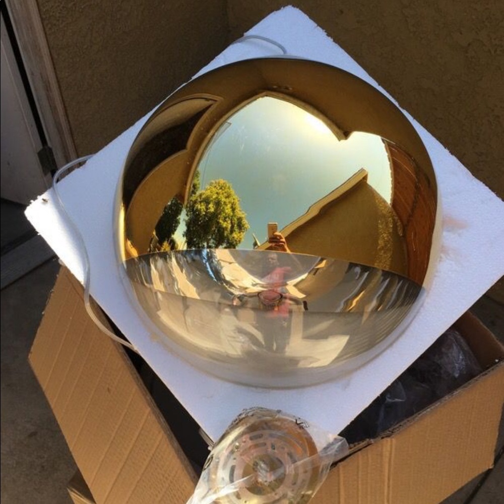 Golden spherical pendant light